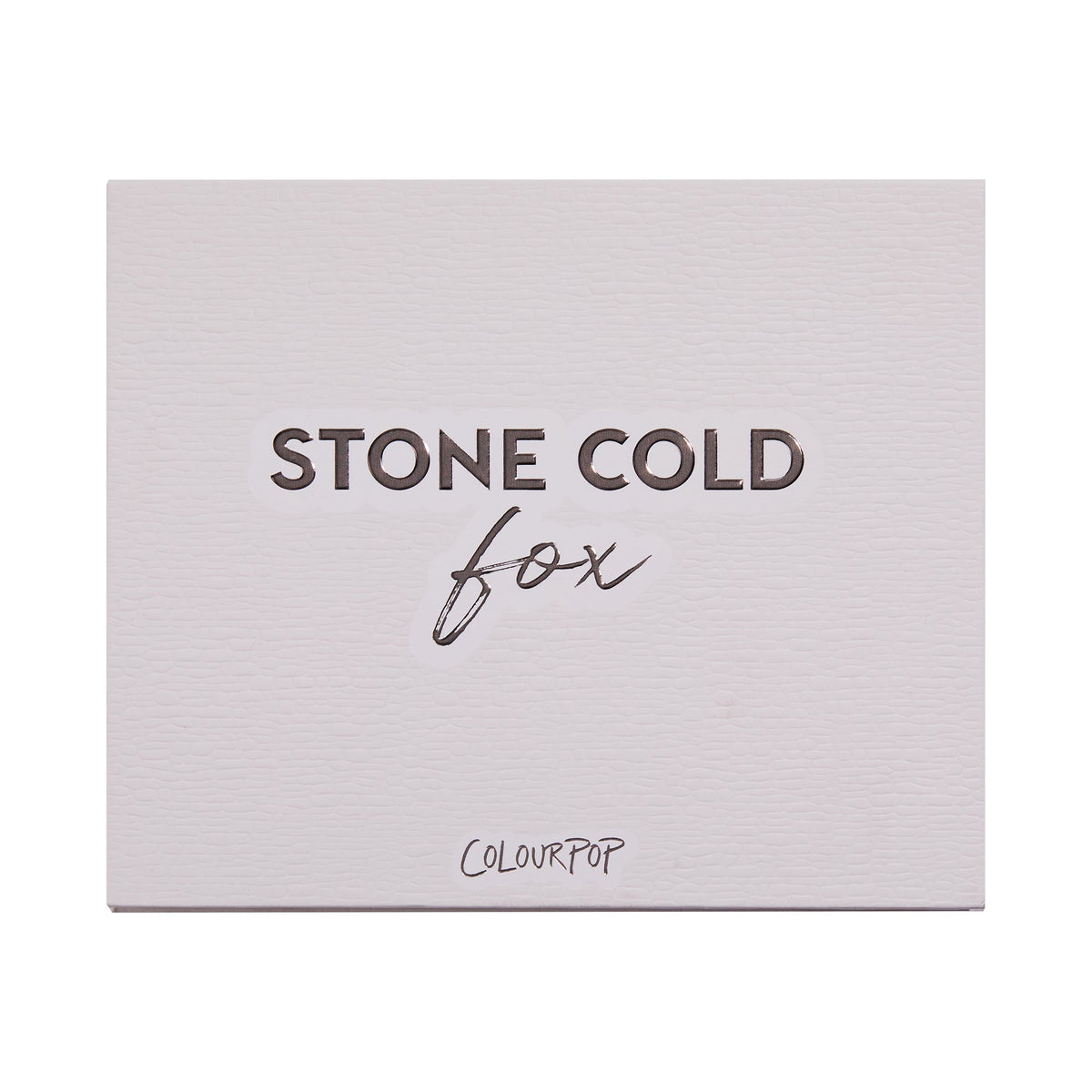 Stone Cold Fox shadow palette shown closed, featuring embossed “STONE COLD fox” lettering on a pale taupe faux-leather cover with ColourPop logo, studio-lit on a white background; a sleek neutral ColourPop Shadow Palette packaging shot.