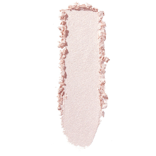 Swatch of Colourpop Mountain Lion Super Shock Shadow, a soft pale pink shimmer eyeshadow, brushed in a vertical streak with slightly crumbled edges on a clean white background.