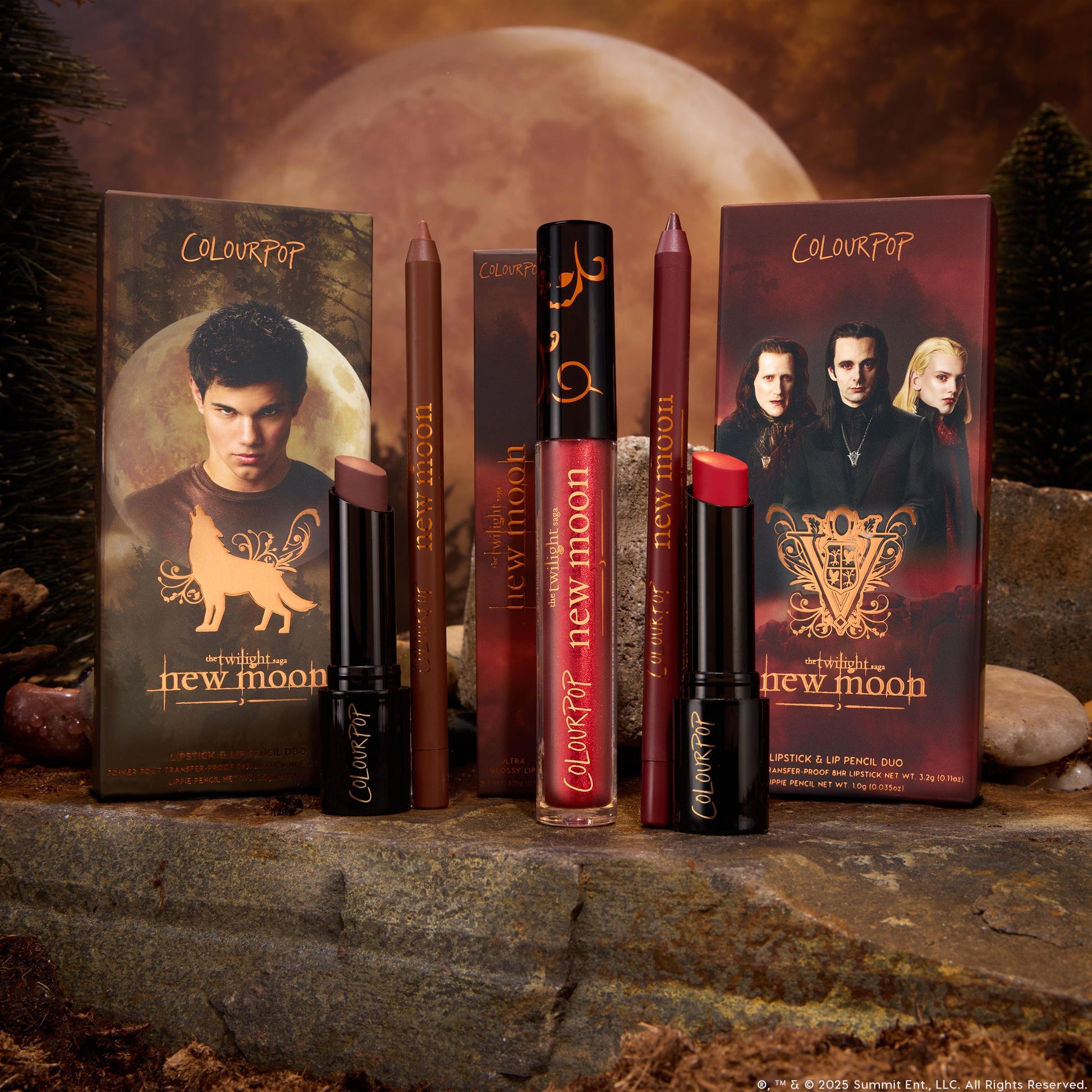 ColourPop Lip Set Pack Member showcases deep brown and berry-red lipsticks with matching lip pencils and red gloss, standing on stone with a forest and full moon backdrop, in Twilight: New Moon–themed packaging.
