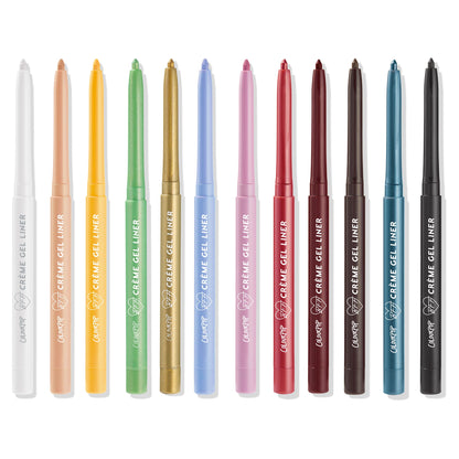 ColourPop Crème Gel Liner It’s a Vibe set lines up 13 retractable gel eyeliners with tips extended on a white background, spanning shades from white, peach, yellow, light green, green, gold, periwinkle, pink, red, burgundy, brown, teal, to black.