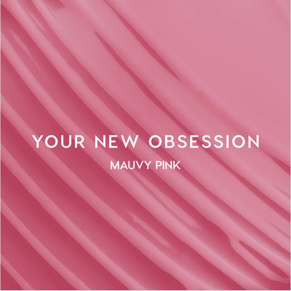 Heart to Get Your New Obsession ultra glossy lip swatch showing smooth mauvy pink gloss streaked diagonally across the frame on a solid background, highlighting the shiny finish and creamy texture for US makeup lovers